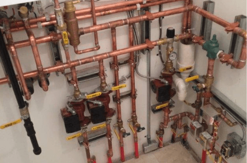 Copper pipes and some pumps for a heating system